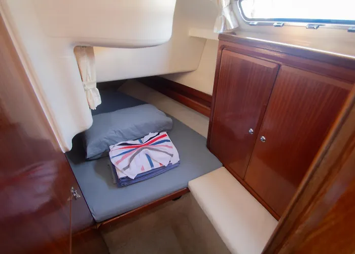 بوتيل On A Sailing Boat In *
